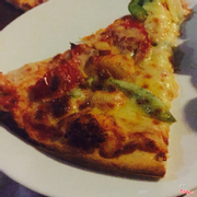 A slice of Lousiana Pizza