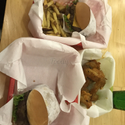 Nice burger and hot wings taste same in USA