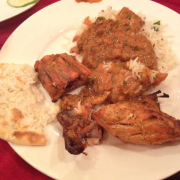 Tandoori chicken, jeera rice, garlic naan, chicken masala. 