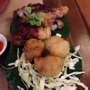 Char grilled chicken with deep fried sticky rice balls