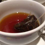 Earlgrey hot tea with 2 honey sticks
