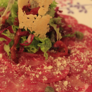 5.	Slices Beef Carpaccio 
with lemon dressing, Parmesan and mixed salad
