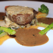 21.	Pan fried Beef Fillet “Café de Paris” 
with sauted vegetables and black pepper sauce
