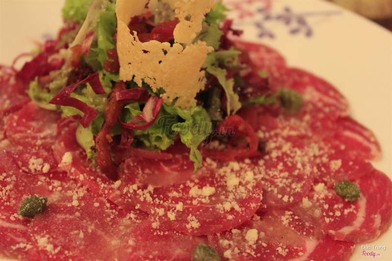 5.	Slices Beef Carpaccio 
with lemon dressing, Parmesan and mixed salad
